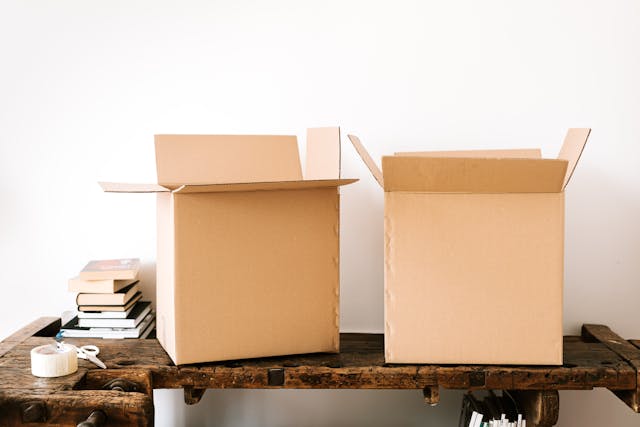 two%20moving%20boxes%20on%20a%20table two%20moving%20boxes%20on%20a%20table